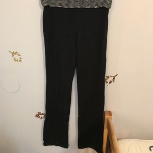 Black yoga pants with a white and black band
